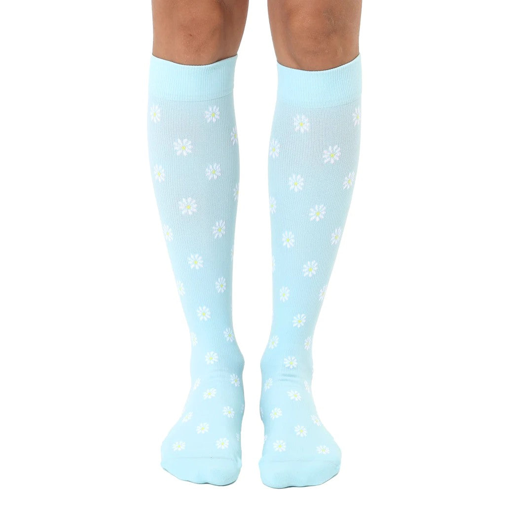 light blue compression socks with daisies