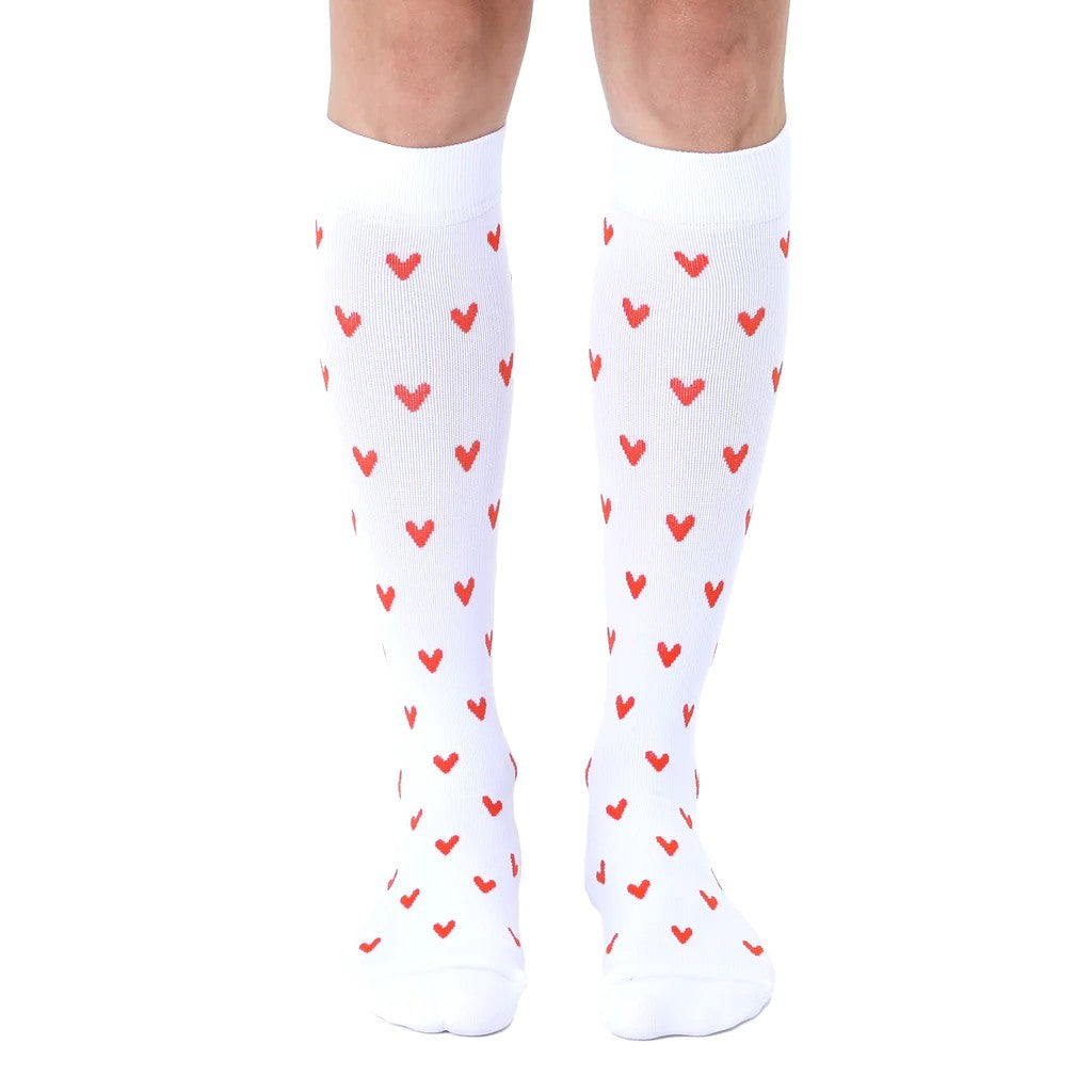White compression socks with red hearts